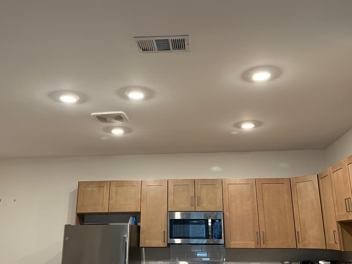 The same kitchen ceiling clean and even above the cabinets